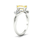 Load image into Gallery viewer, floral-leaf-emerald-cut-vivid-yellow-engagement-ring-in-white-gold-fdenr10962emgvyellowangle2-nl-wg.jpg