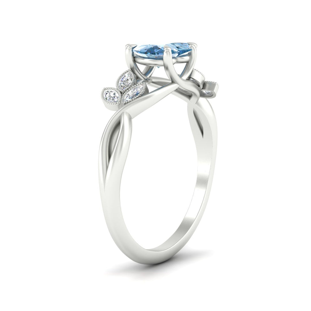 floral-leaf-heart-shaped-vivid-blue-engagement-ring-in-white-gold-fdenr10962htgvblueangle2-nl-wg.jpg