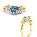 Load image into Gallery viewer, floral-leaf-heart-shaped-vivid-blue-engagement-ring-in-yellow-gold-fdenr10962htgvblueangle3-nl-yg.jpg