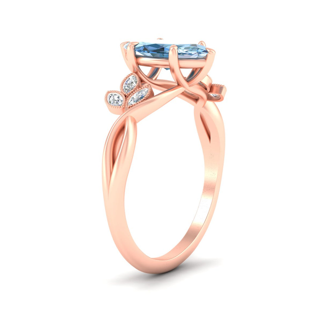 floral-leaf-marquise-cut-vivid-blue-engagement-ring-in-rose-gold-fdenr10962mqgvblueangle2-nl-rg.jpg