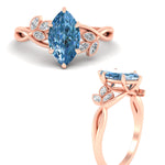 Load image into Gallery viewer, floral-leaf-marquise-cut-vivid-blue-engagement-ring-in-rose-gold-fdenr10962mqgvblueangle3-nl-rg.jpg