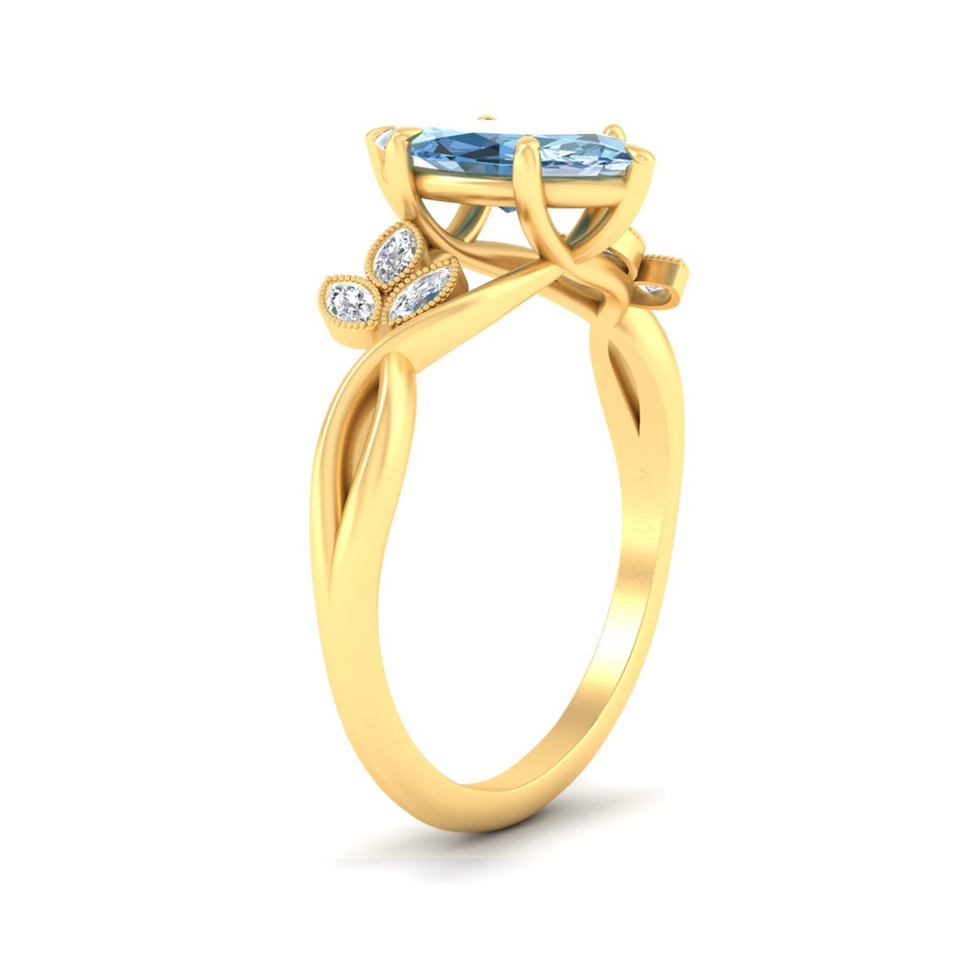 floral-leaf-marquise-cut-vivid-blue-engagement-ring-in-yellow-gold-fdenr10962mqgvblueangle2-nl-yg.jpg