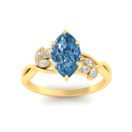 Load image into Gallery viewer, floral-leaf-marquise-cut-vivid-blue-engagement-ring-in-yellow-gold-fdenr10962mqgvblueangle5-nl-yg.jpg