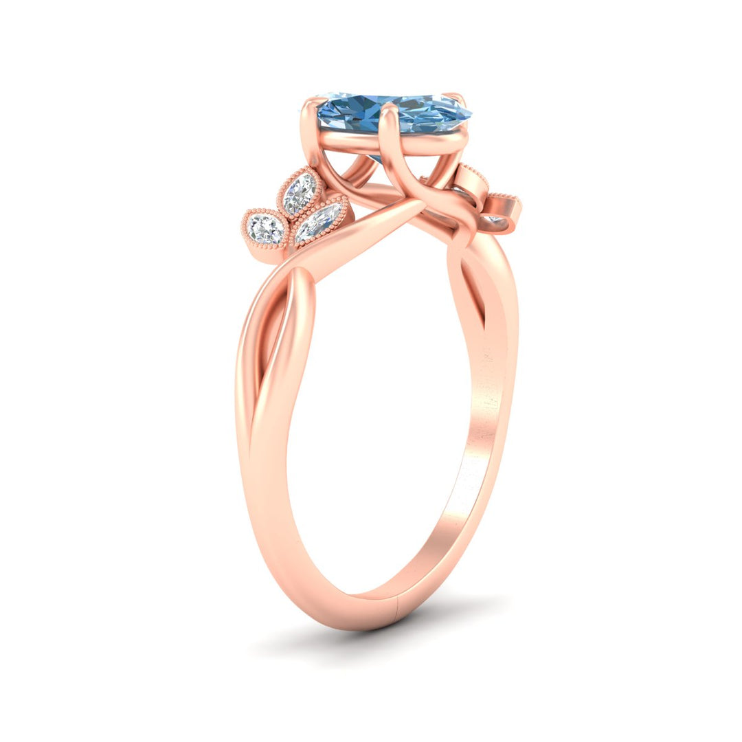 floral-leaf-oval-shaped-vivid-blue-engagement-ring-in-rose-gold-fdenr10962ovgvblueangle2-nl-rg.jpg