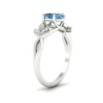 Load image into Gallery viewer, floral-leaf-oval-shaped-vivid-blue-engagement-ring-in-white-gold-fdenr10962ovgvblueangle2-nl-wg.jpg