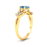 Load image into Gallery viewer, floral-leaf-oval-shaped-vivid-blue-engagement-ring-in-yellow-gold-fdenr10962ovgvblueangle2-nl-yg.jpg