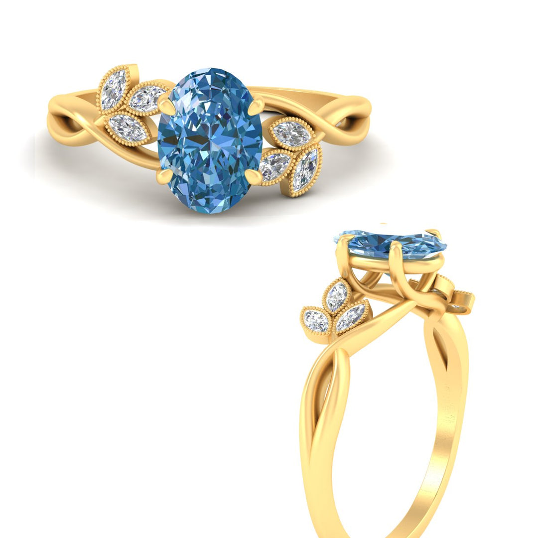 floral-leaf-oval-shaped-vivid-blue-engagement-ring-in-yellow-gold-fdenr10962ovgvblueangle3-nl-yg.jpg