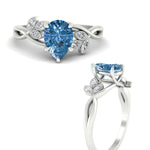Load image into Gallery viewer, floral-leaf-pear-shaped-vivid-blue-engagement-ring-in-white-gold-fdenr10962pegvblueangle3-nl-wg.jpg