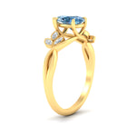 Load image into Gallery viewer, floral-leaf-pear-shaped-vivid-blue-engagement-ring-in-yellow-gold-fdenr10962pegvblueangle2-nl-yg.jpg