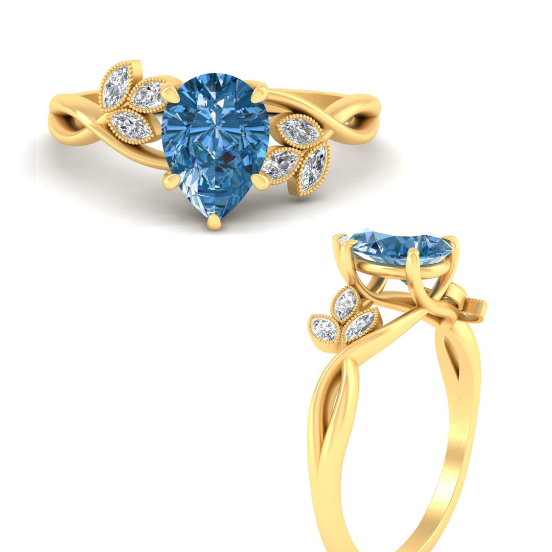 floral-leaf-pear-shaped-vivid-blue-engagement-ring-in-yellow-gold-fdenr10962pegvblueangle3-nl-yg.jpg