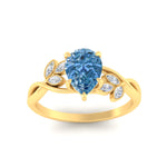 Load image into Gallery viewer, floral-leaf-pear-shaped-vivid-blue-engagement-ring-in-yellow-gold-fdenr10962pegvblueangle5-nl-yg.jpg