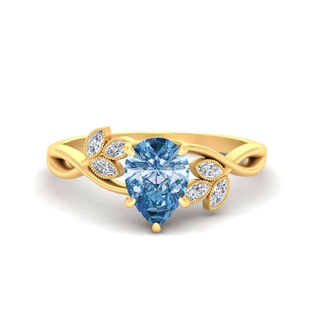 floral-leaf-pear-shaped-vivid-blue-engagement-ring-in-yellow-gold-fdenr10962pegvbluesleep-nl-yg.jpg