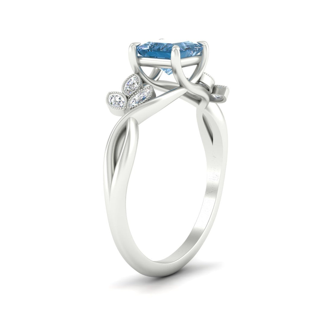 floral-leaf-princess-cut-vivid-blue-engagement-ring-in-white-gold-fdenr10962prgvblueangle2-nl-wg.jpg