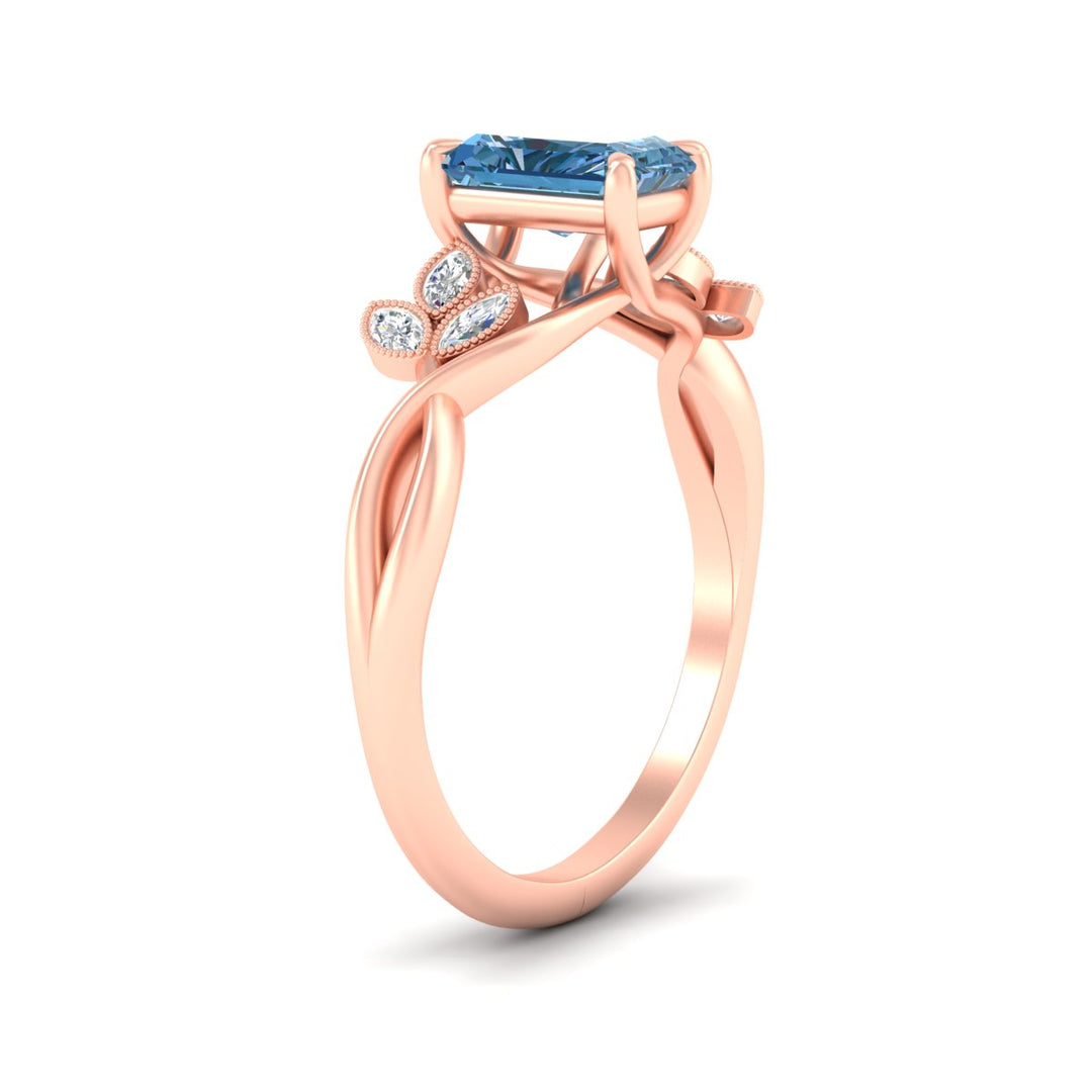 floral-leaf-radiant-cut-vivid-blue-engagement-ring-in-rose-gold-fdenr10962ragvblueangle2-nl-rg.jpg
