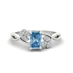 Load image into Gallery viewer, floral-leaf-radiant-cut-vivid-blue-engagement-ring-in-white-gold-fdenr10962ragvbluesleep-nl-wg.jpg