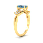 Load image into Gallery viewer, floral-leaf-radiant-cut-vivid-blue-engagement-ring-in-yellow-gold-fdenr10962ragvblueangle2-nl-yg.jpg