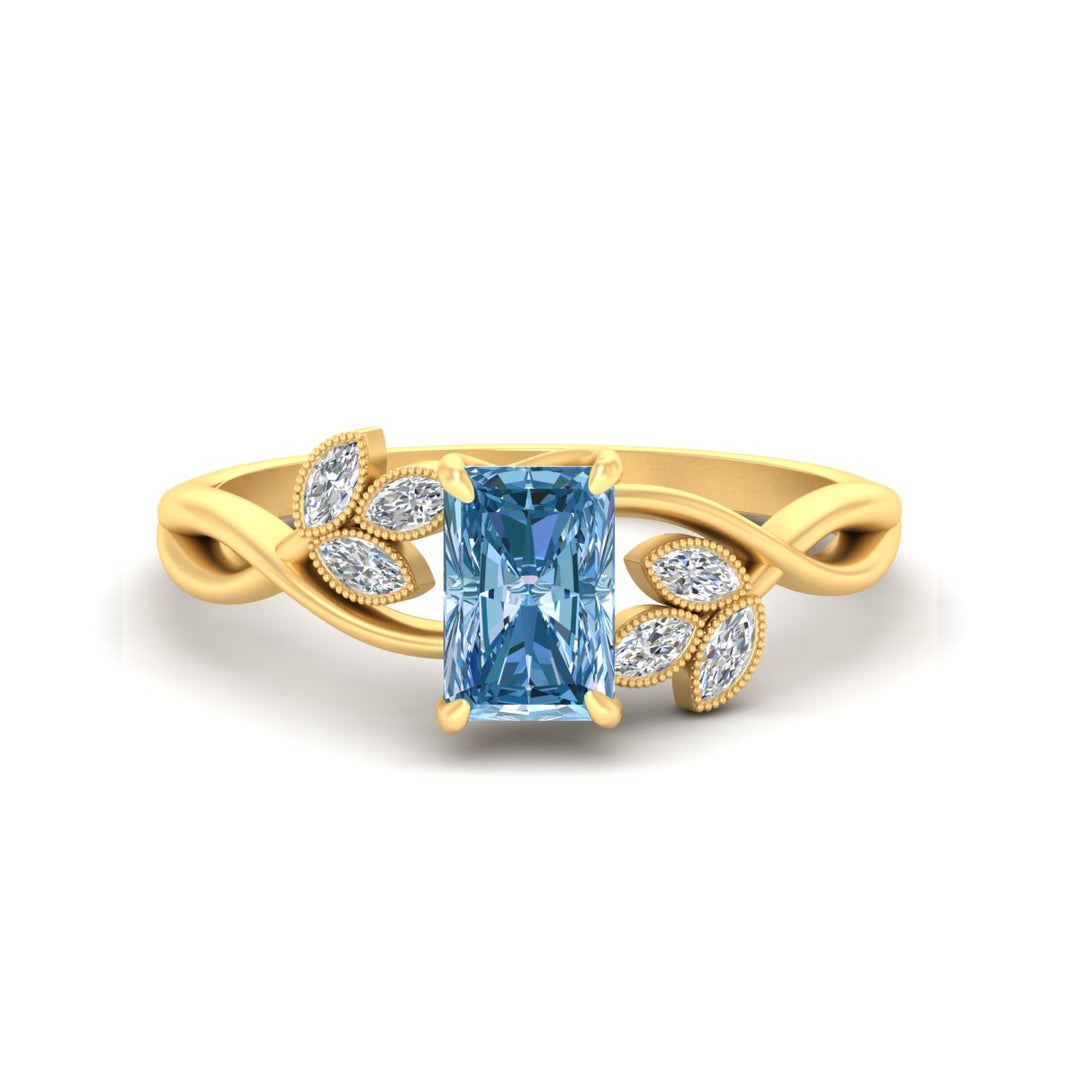 floral-leaf-radiant-cut-vivid-blue-engagement-ring-in-yellow-gold-fdenr10962ragvbluesleep-nl-yg.jpg
