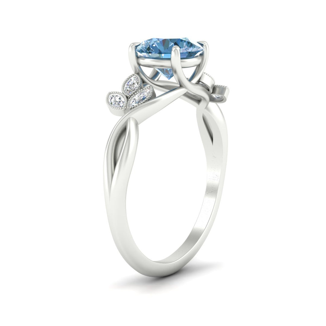 floral-leaf-round-cut-vivid-blue-engagement-ring-in-white-gold-fdenr10962rogvblueangle2-nl-wg.jpg
