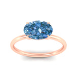 Load image into Gallery viewer, horizontal-oval-4-prong-vivid-blue-engagement-ring-in-rose-gold-fd11749ovrgvblueangle5-nl-rg.jpg?v=1788845159