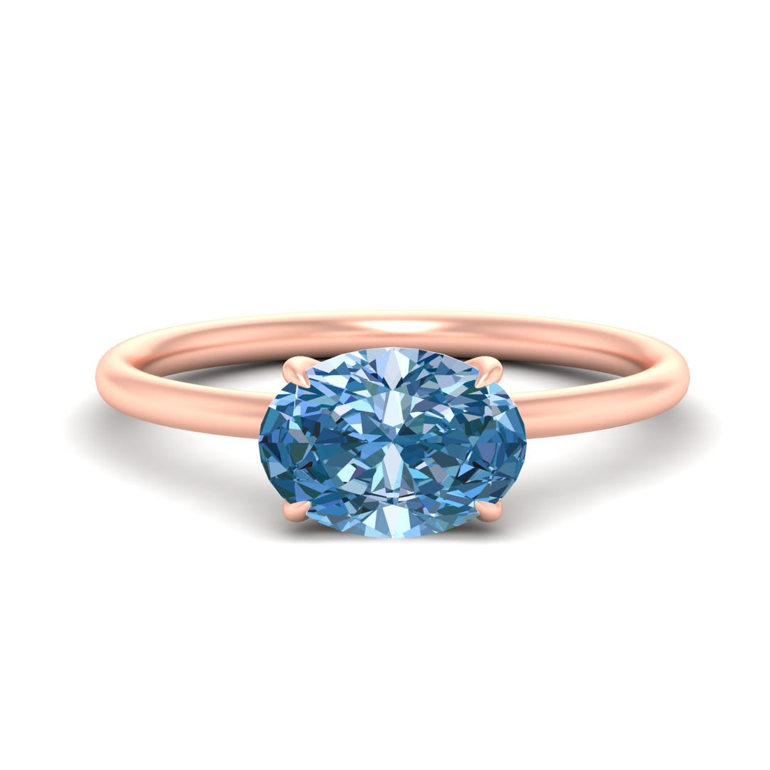 horizontal-oval-4-prong-vivid-blue-engagement-ring-in-rose-gold-fd11749ovrgvbluesleep-nl-rg.jpg?v=1788845159