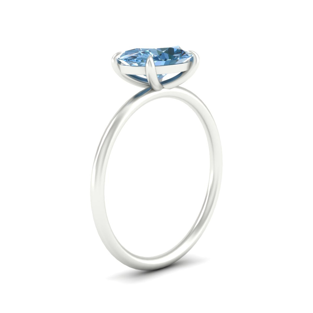 horizontal-oval-4-prong-vivid-blue-engagement-ring-in-white-gold-fd11749ovrgvblueangle2-nl-wg.jpg?v=1788845172