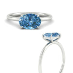 Load image into Gallery viewer, horizontal-oval-4-prong-vivid-blue-engagement-ring-in-white-gold-fd11749ovrgvblueangle3-nl-wg.jpg?v=1788845173