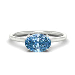 Load image into Gallery viewer, horizontal-oval-4-prong-vivid-blue-engagement-ring-in-white-gold-fd11749ovrgvbluesleep-nl-wg.jpg?v=1788845173