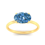 Load image into Gallery viewer, horizontal-oval-4-prong-vivid-blue-engagement-ring-in-yellow-gold-fd11749ovrgvblueangle5-nl-yg.jpg?v=1788845172