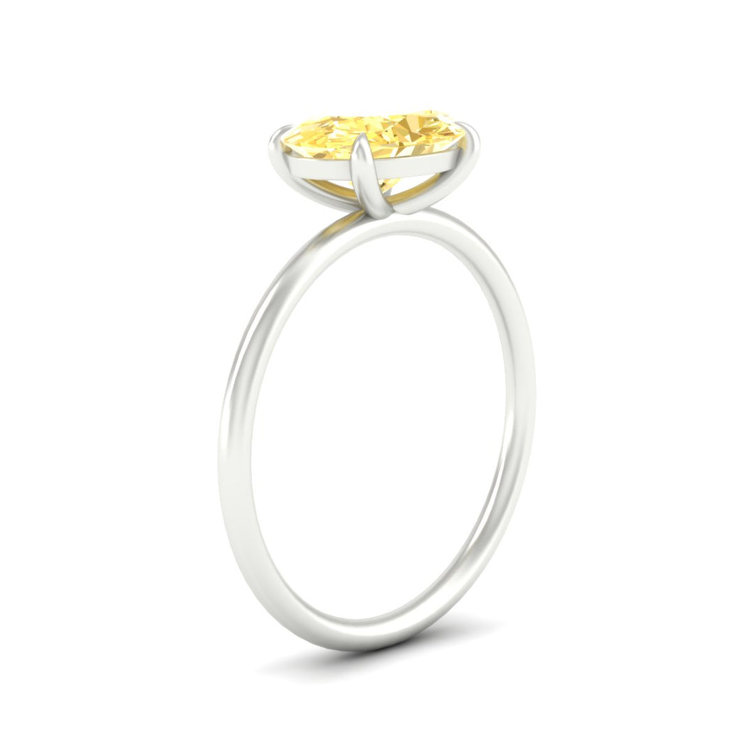 horizontal-oval-4-prong-vivid-yellow-engagement-ring-in-white-gold-fd11749ovrgvyellowangle2-nl-wg.jpg?v=1788845201