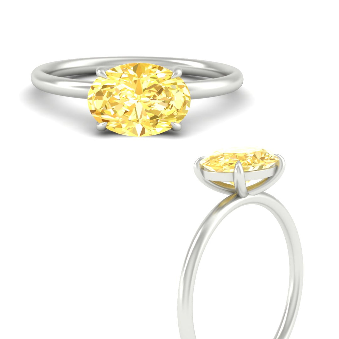 horizontal-oval-4-prong-vivid-yellow-engagement-ring-in-white-gold-fd11749ovrgvyellowangle3-nl-wg.jpg?v=1788845201
