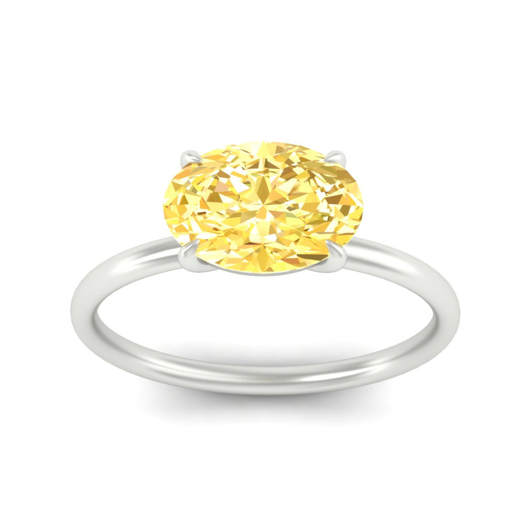 horizontal-oval-4-prong-vivid-yellow-engagement-ring-in-white-gold-fd11749ovrgvyellowangle5-nl-wg.jpg?v=1788845201