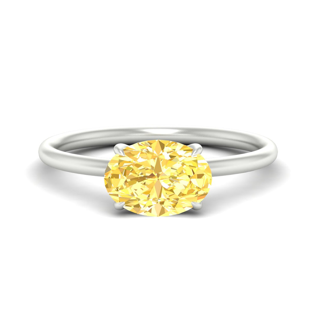 horizontal-oval-4-prong-vivid-yellow-engagement-ring-in-white-gold-fd11749ovrgvyellowsleep-nl-wg.jpg?v=1788845201
