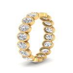 Load image into Gallery viewer, Bezel Lab Diamond Oval Cut Eternity Women Ring In 14K Yellow Gold | Cuts &amp; Carat
