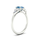 Load image into Gallery viewer, oval-cut-vivid-blue-marquise-floral-engagement-ring-in-white-gold-fdenr11764ovgvblueangle2-nl-wg.jpg