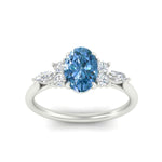 Load image into Gallery viewer, oval-cut-vivid-blue-marquise-floral-engagement-ring-in-white-gold-fdenr11764ovgvblueangle5-nl-wg.jpg