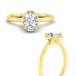 Load image into Gallery viewer, oval-shaped-collet-set-solitaire-diamond-engagement-ring-in-yellow-gold-fdenr11593ovangle3-nl-yg.jpg