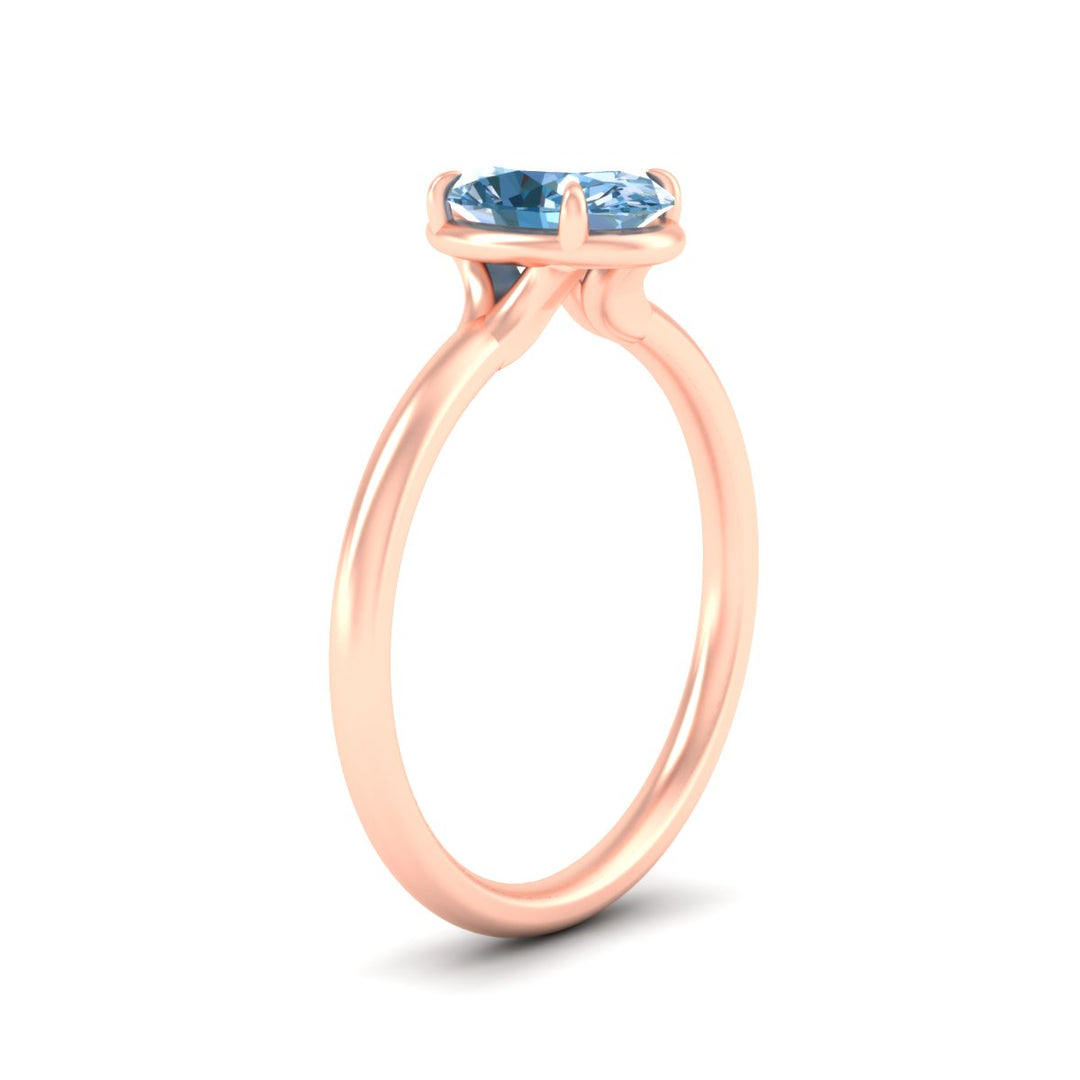 oval-shaped-collet-set-solitaire-vivid-blue-engagement-ring-in-rose-gold-fdenr11593ovgvblueangle2-nl-rg.jpg