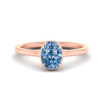 Load image into Gallery viewer, oval-shaped-collet-set-solitaire-vivid-blue-engagement-ring-in-rose-gold-fdenr11593ovgvbluesleep-nl-rg.jpg