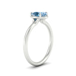 Load image into Gallery viewer, oval-shaped-collet-set-solitaire-vivid-blue-engagement-ring-in-white-gold-fdenr11593ovgvblueangle2-nl-wg.jpg