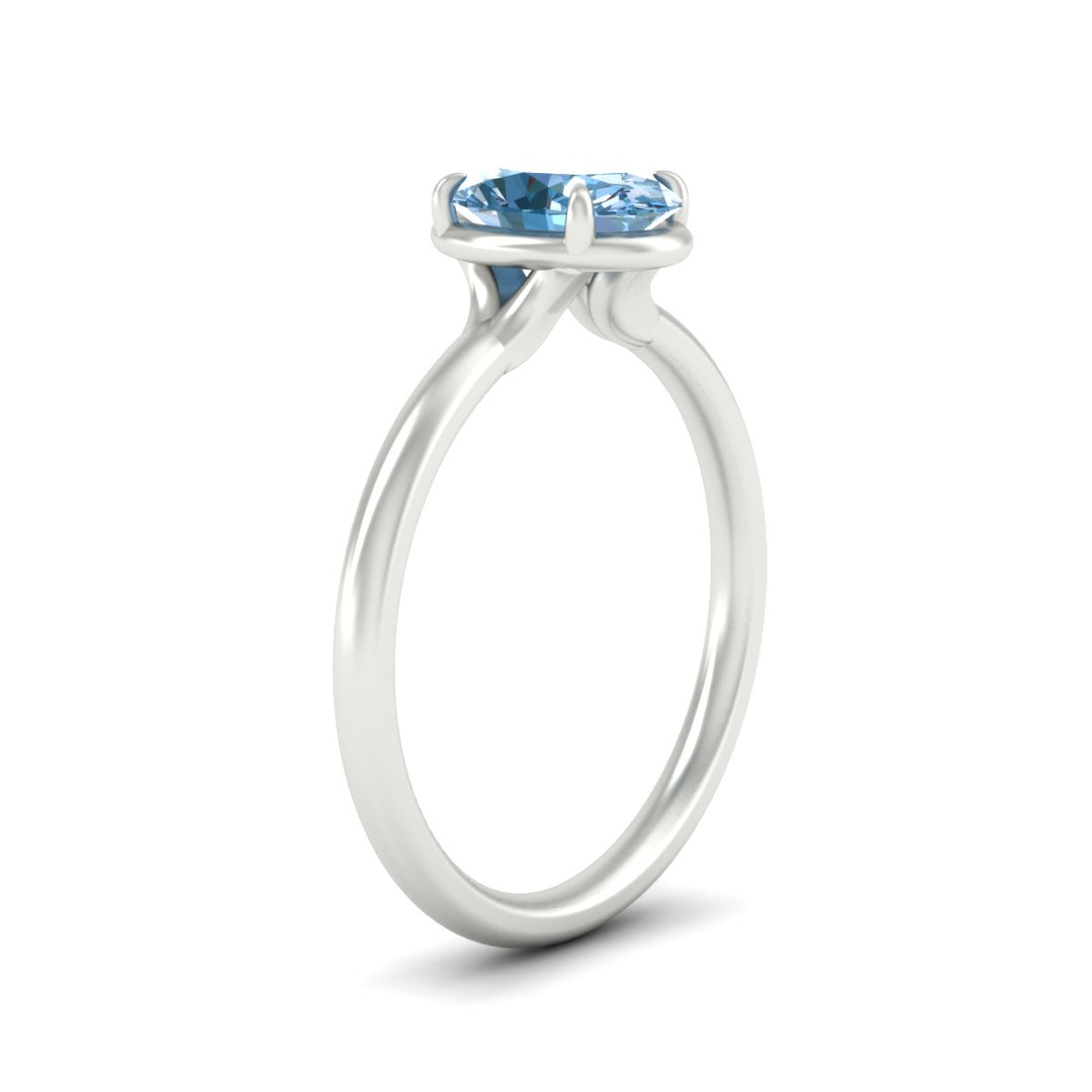 oval-shaped-collet-set-solitaire-vivid-blue-engagement-ring-in-white-gold-fdenr11593ovgvblueangle2-nl-wg.jpg