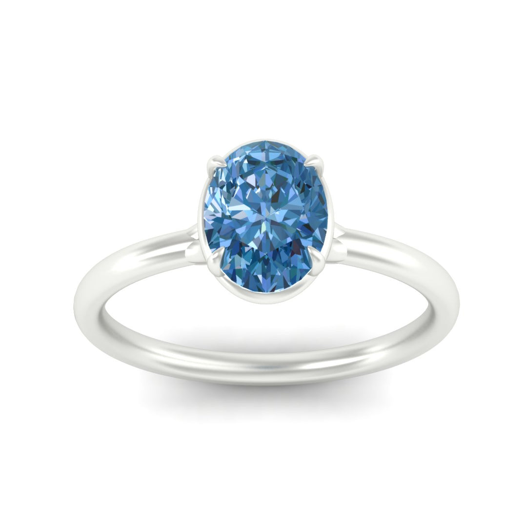 oval-shaped-collet-set-solitaire-vivid-blue-engagement-ring-in-white-gold-fdenr11593ovgvblueangle5-nl-wg.jpg