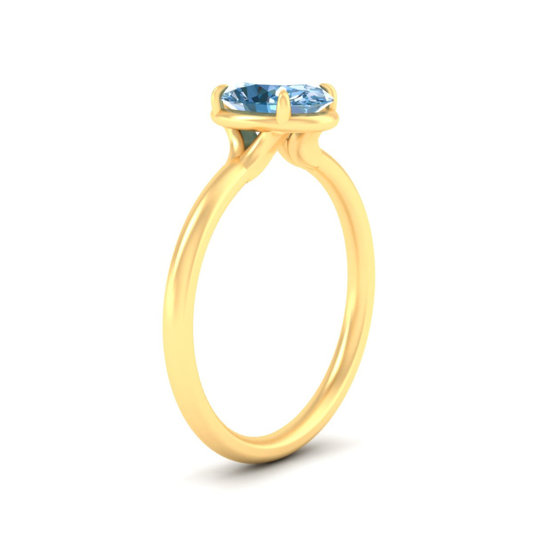 oval-shaped-collet-set-solitaire-vivid-blue-engagement-ring-in-yellow-gold-fdenr11593ovgvblueangle2-nl-yg.jpg