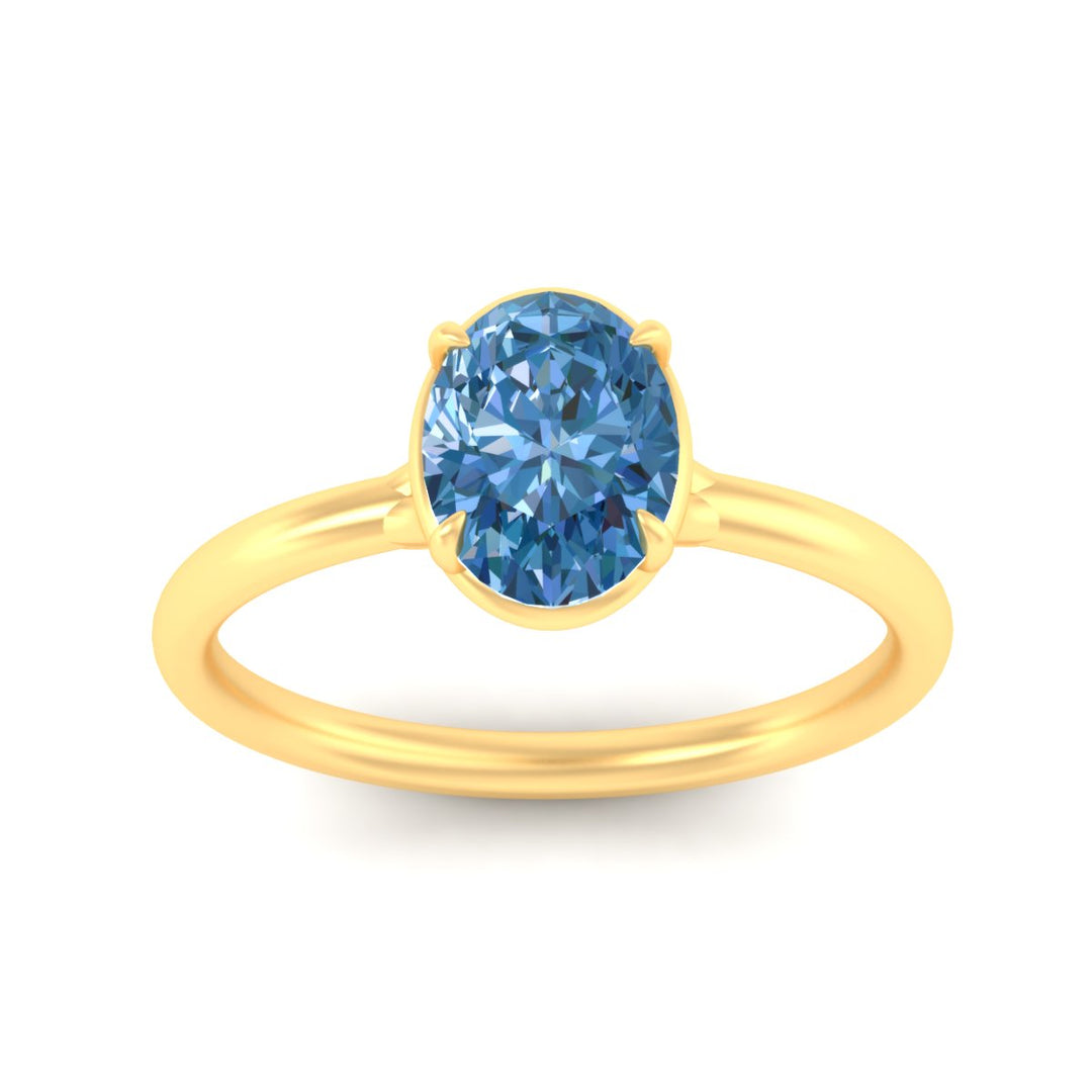 oval-shaped-collet-set-solitaire-vivid-blue-engagement-ring-in-yellow-gold-fdenr11593ovgvblueangle5-nl-yg.jpg