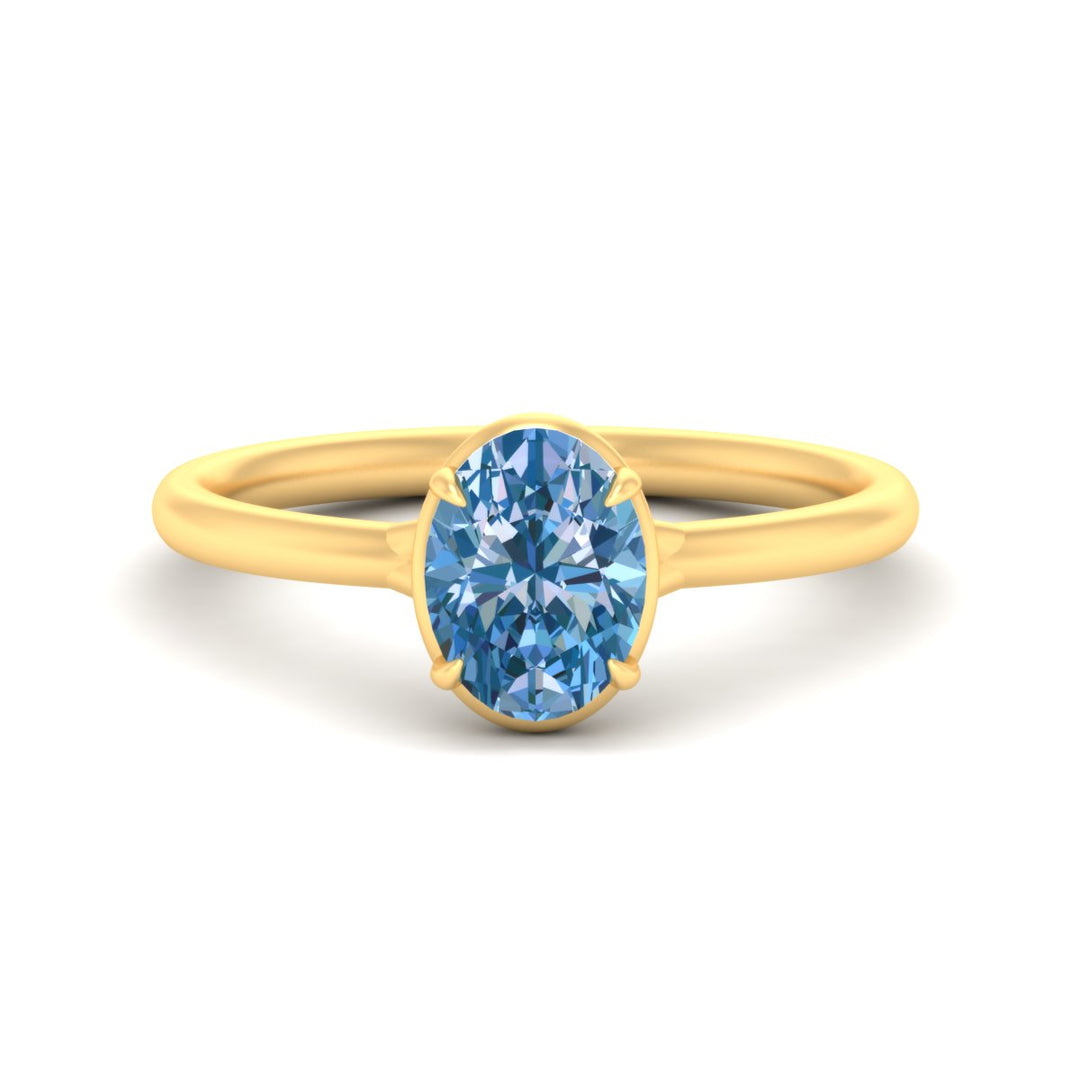 oval-shaped-collet-set-solitaire-vivid-blue-engagement-ring-in-yellow-gold-fdenr11593ovgvbluesleep-nl-yg.jpg