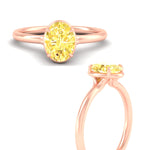Load image into Gallery viewer, oval-shaped-collet-set-solitaire-vivid-yellow-engagement-ring-in-rose-gold-fdenr11593ovgvyellowangle3-nl-rg.jpg