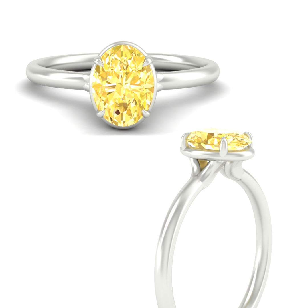 oval-shaped-collet-set-solitaire-vivid-yellow-engagement-ring-in-white-gold-fdenr11593ovgvyellowangle3-nl-wg.jpg