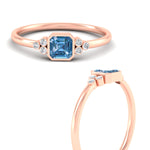 Load image into Gallery viewer, petite-bezel-set-asscher-cut-vivid-blue-engagement-ring-in-rose-gold-fdenr9175asgvblueangle3-nl-rg.jpg