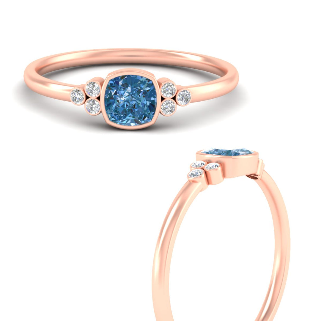 petite-bezel-set-cushion-cut-vivid-blue-engagement-ring-in-rose-gold-fdenr9175cugvblueangle3-nl-rg.jpg