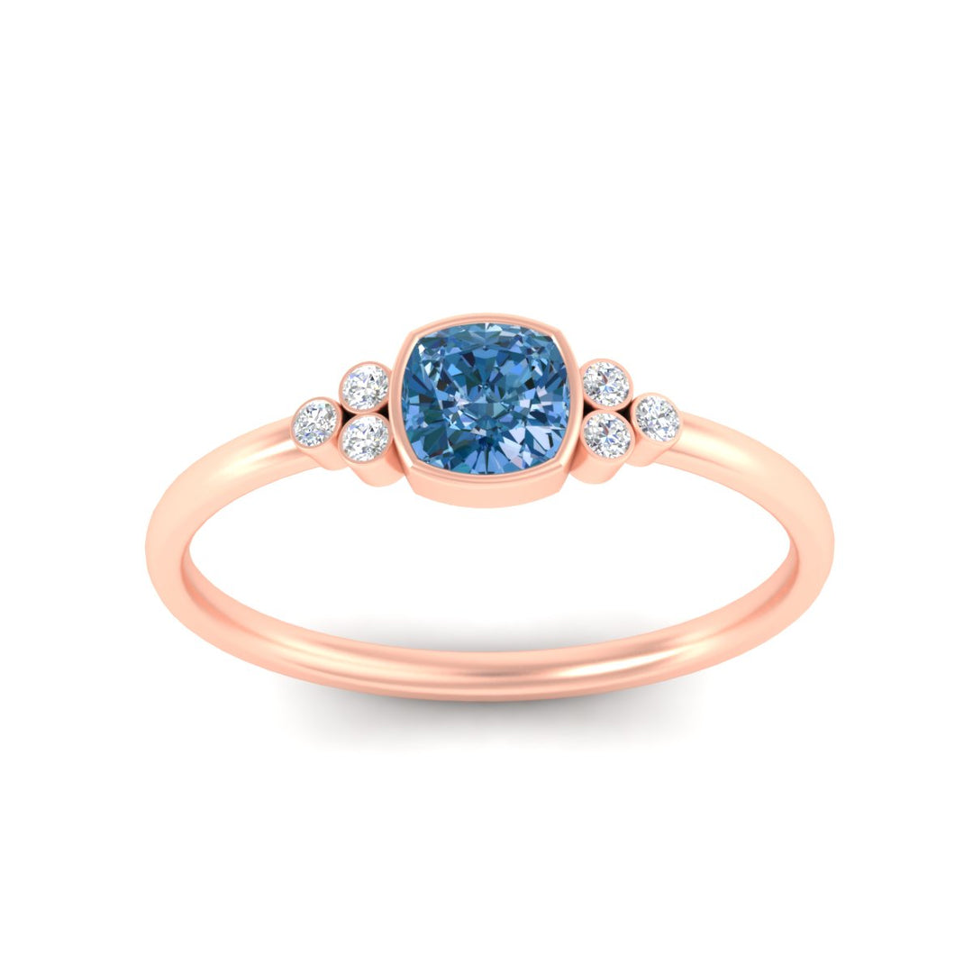petite-bezel-set-cushion-cut-vivid-blue-engagement-ring-in-rose-gold-fdenr9175cugvblueangle5-nl-rg.jpg