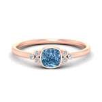 Load image into Gallery viewer, petite-bezel-set-cushion-cut-vivid-blue-engagement-ring-in-rose-gold-fdenr9175cugvbluesleep-nl-rg.jpg
